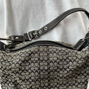 Coach mini hand Bag in Black and  cream Signature Jacquard